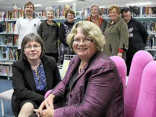 REPRIEVE: Sue McKerracher (front left) and Judy Brooker from the Australian Library and Information Association with supporters and staff Matthew Hanlon, Corena Wynd, Pam Crummy, Esabel Henry, Lesley Burgoyne and Peter Harris at the Goonellabah Library. Picture: Andy Parks