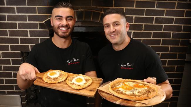 Jeremy Agha and Najib Haddad with their prized awarma and egg pizza. Picture: Robert Pozo