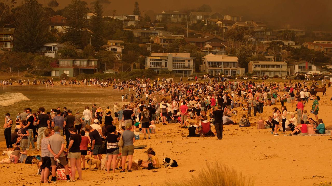 Locals seek refuge in Malua Bay, just south of Batemans Bay. Picture: Alex Coppel.