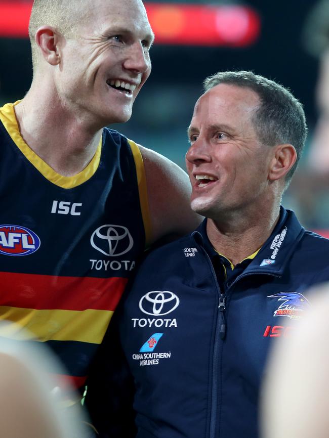 Sam Jacobs of the Crows is all smiles with coach Don Pyke following the narrow win. Picture: AAP Image/Kelly Barnes