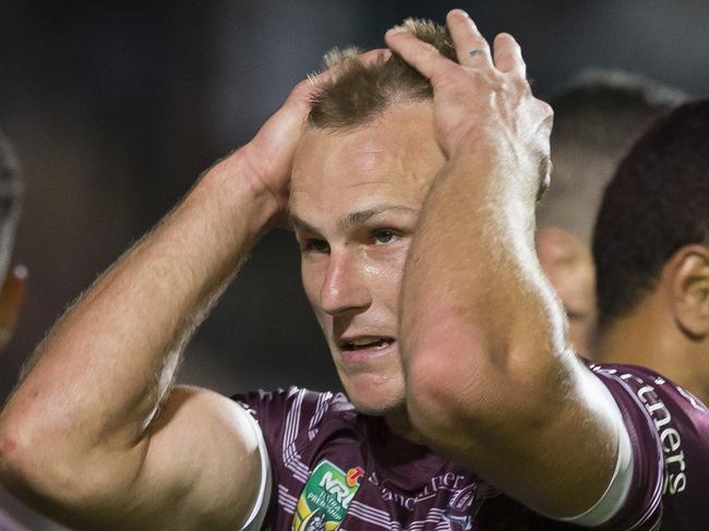 Daly Cherry-Evans of the Sea Eagles reacts to another Wests Tigers try during the Round 6 NRL match between the Manly-Warringah Sea Eagles and the Wests Tigers at Lottoland in Sydney, Sunday, April 15, 2018. (AAP Image/Craig Golding) NO ARCHIVING, EDITORIAL USE ONLY