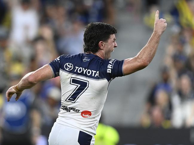 Cowboys halfback Chad Townsend celebrates after kicking the winning field goal. Picture: Getty Images