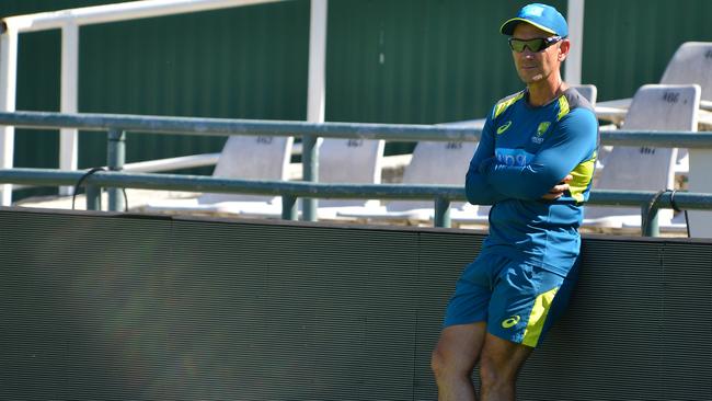 Justin Langer remains on limited duties and pay during a challenging time for the sport.