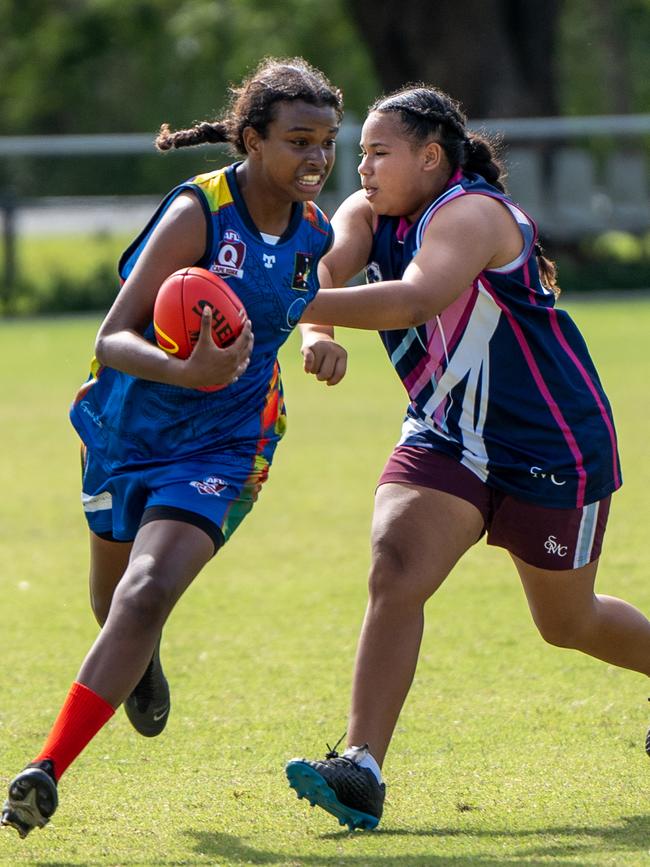 India Nevill from Tagai State College with the ball during the AFL School Cup. Picture: Nuno Avendano.