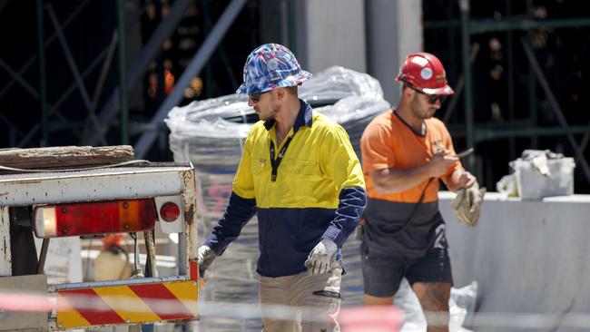 MELBOURNE, AUSTRALIA - NewsWire Photos JANUARY 20, 2020. Construction workers at an apartment building in Richmond on Wednesday afternoon. Australian industries are hiring in droves as the economy begins to recover from COVID-19 Picture: NCA NewsWire / David Geraghty