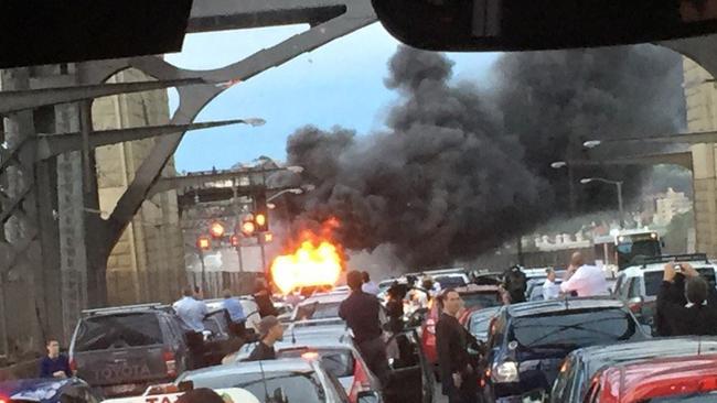 The fire caused traffic chaos, with all lanes of the Harbour Bridge closed during peak hour. Alex Heath Twitter @sydheatha