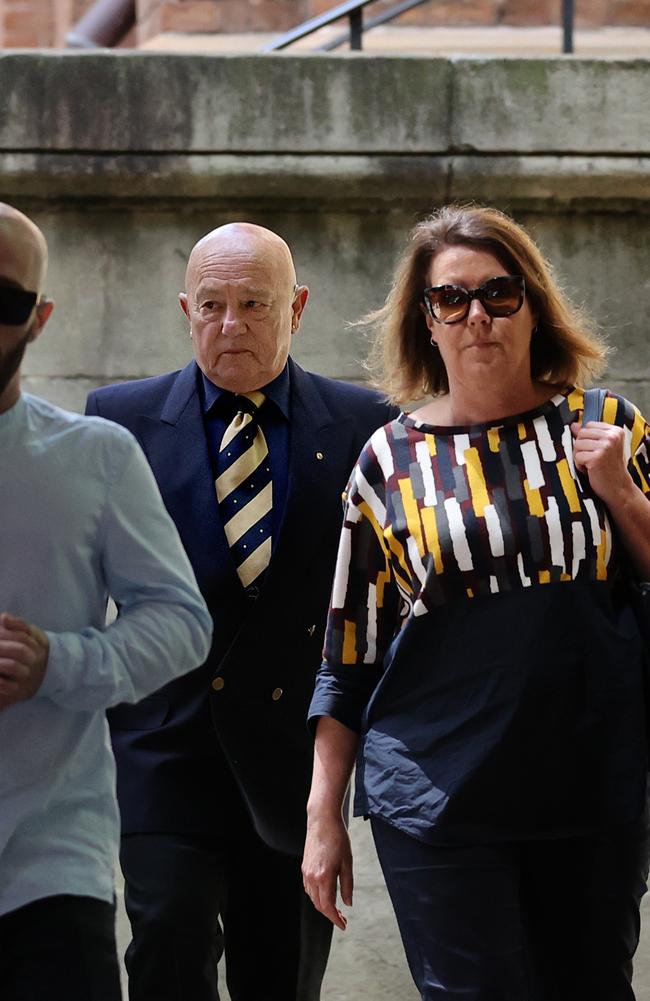 Rocker Angry Anderson (centre, striped tie) arriving at King Street court at the beginning of the trial into his son’s alleged murder. Picture: Dylan Coker/NewsWire