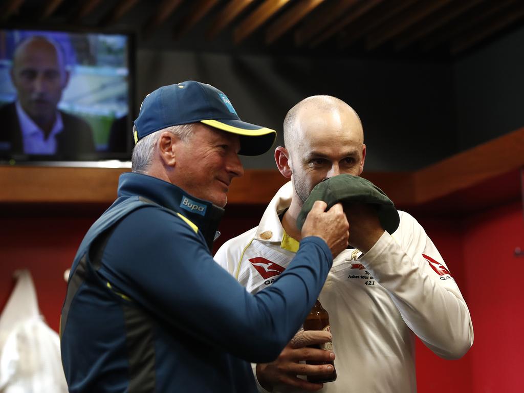 MANCHESTER, ENGLAND - SEPTEMBER 08: Nathan Lyon of Australia and Steve Waugh, Australian Team Mentor, celebrate in the change rooms after Australia claimed victory to retain the Ashes during day five of the 4th Specsavers Test between England and Australia at Old Trafford on September 08, 2019 in Manchester, England. (Photo by Ryan Pierse/Getty Images)