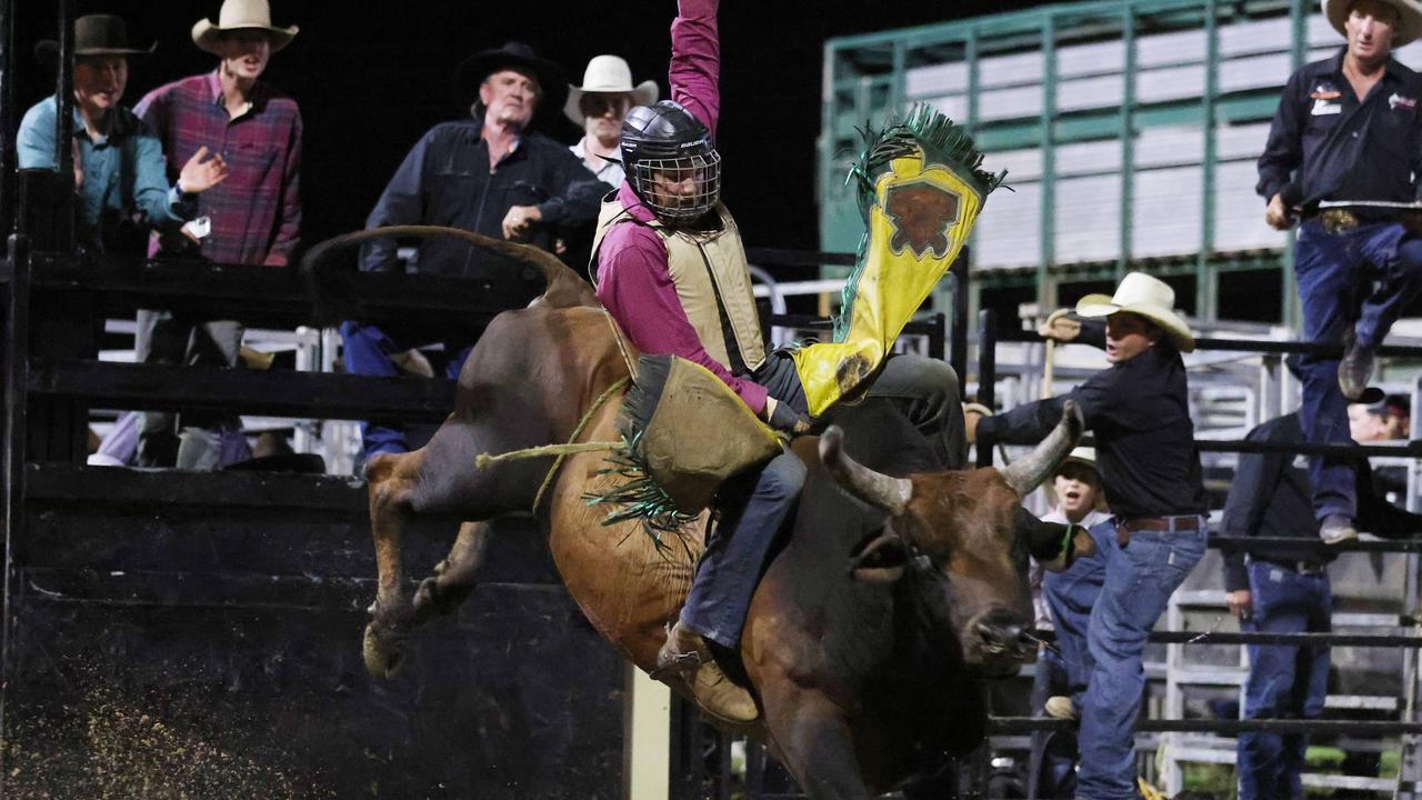 Jake Simpson competes in the Great Northern Bull riding series bull ride event at the Mossman Showgrounds. Picture: Stephen Harman