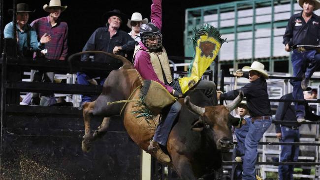 Jake Simpson competes in the Great Northern Bull riding series bull ride event at the Mossman Showgrounds. Picture: Stephen Harman