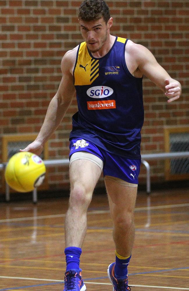 <br/>Elite status awaits ... Luke Shuey kicks during training. Picture: Hamish Blair