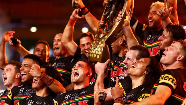 The Panthers celebrate with the NRL Premiership Trophy