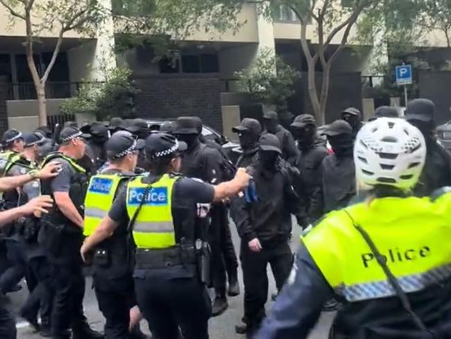 Police confront a group of neo-Nazis at a pro-refugee rally. Picture: TikTok/permanentvisaforrefugees