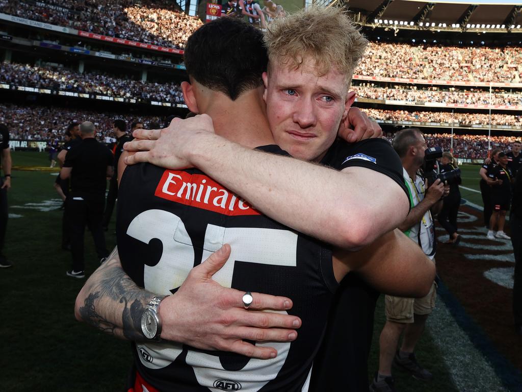 An emotional John Noble with Nick Daicos after the 2023 grand final. Picture: Michael Klein