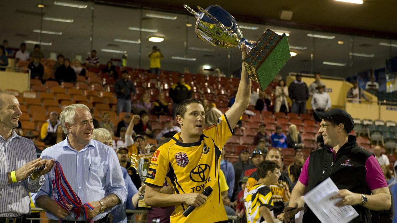 Hawks captain Aaron Werth raises the TRL cup. Photo: Kevin Farmer