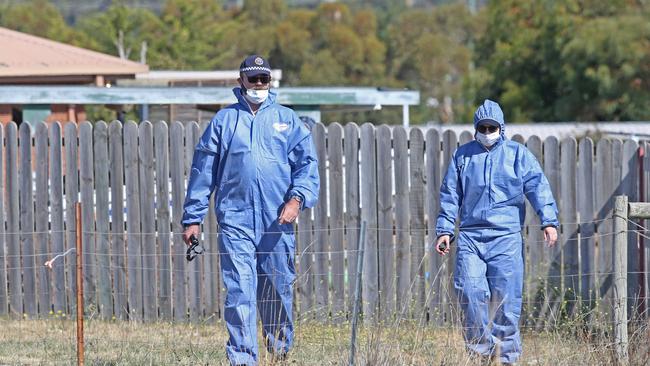 Tasmanian police at the scene after Geoffrey Mason was shot dead by police in February 2020. Picture: Zak Simmonds