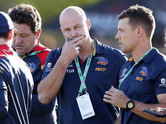 Matthew Nicks with some of his football assistants during a pre-season match. Picture: Sarah Reed.