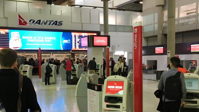Security overhauls could see anyone in the terminal but not travelling being required to produce ID. Picture: Liam Kidston