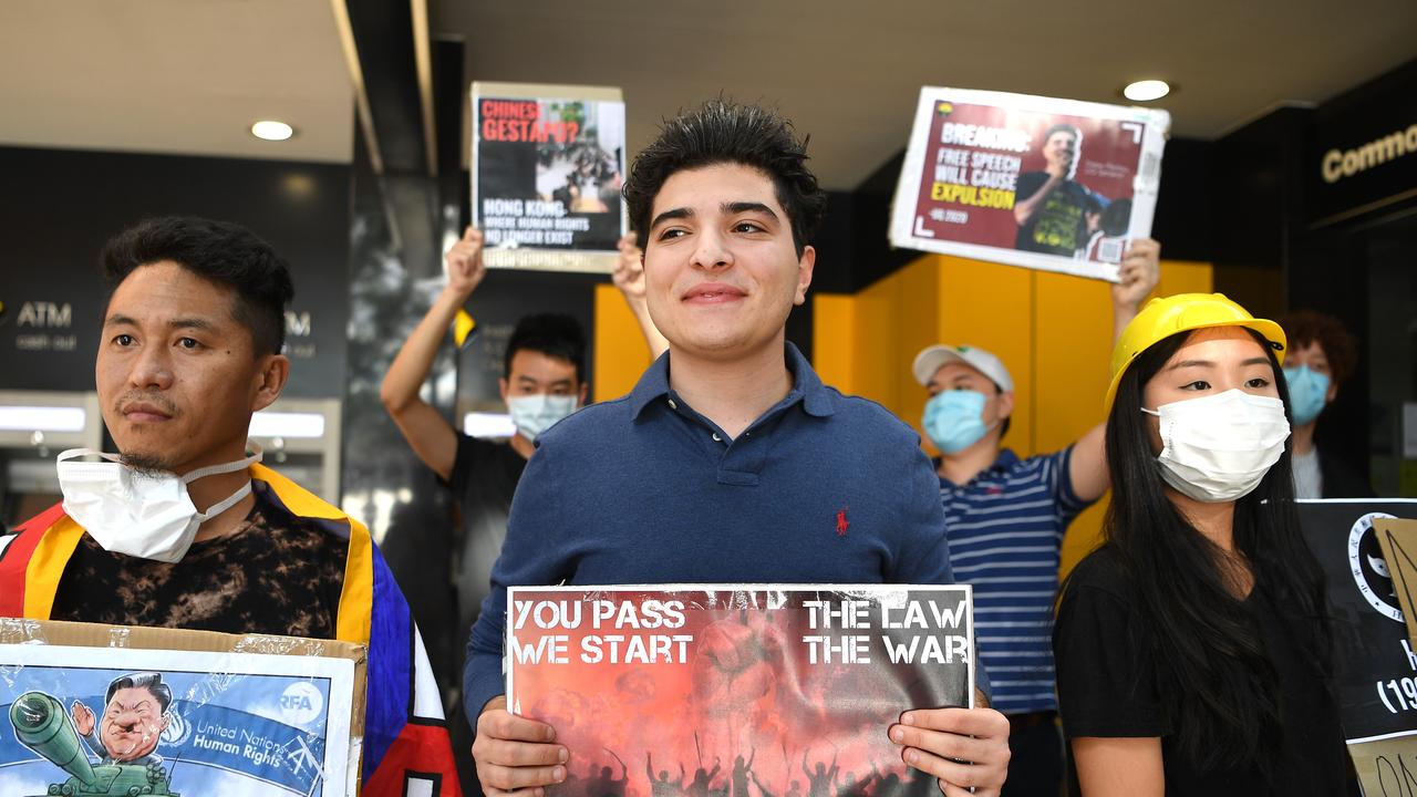 Not backing down: Drew Pavlou outside the Chinese consulate in Brisbane, protesting against the Hong Kong crackdown. Picture: NCA Newswire/Dan Peled.