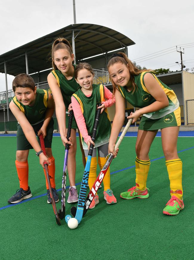 Lucas Hart, Emily Hart, Chloe Kong and Olivia Hart are part of Woodville’s junior program. The club will focus on developing the juniors next season as it will not have teams in the Premier League. Picture: AAP/ Keryn Stevens