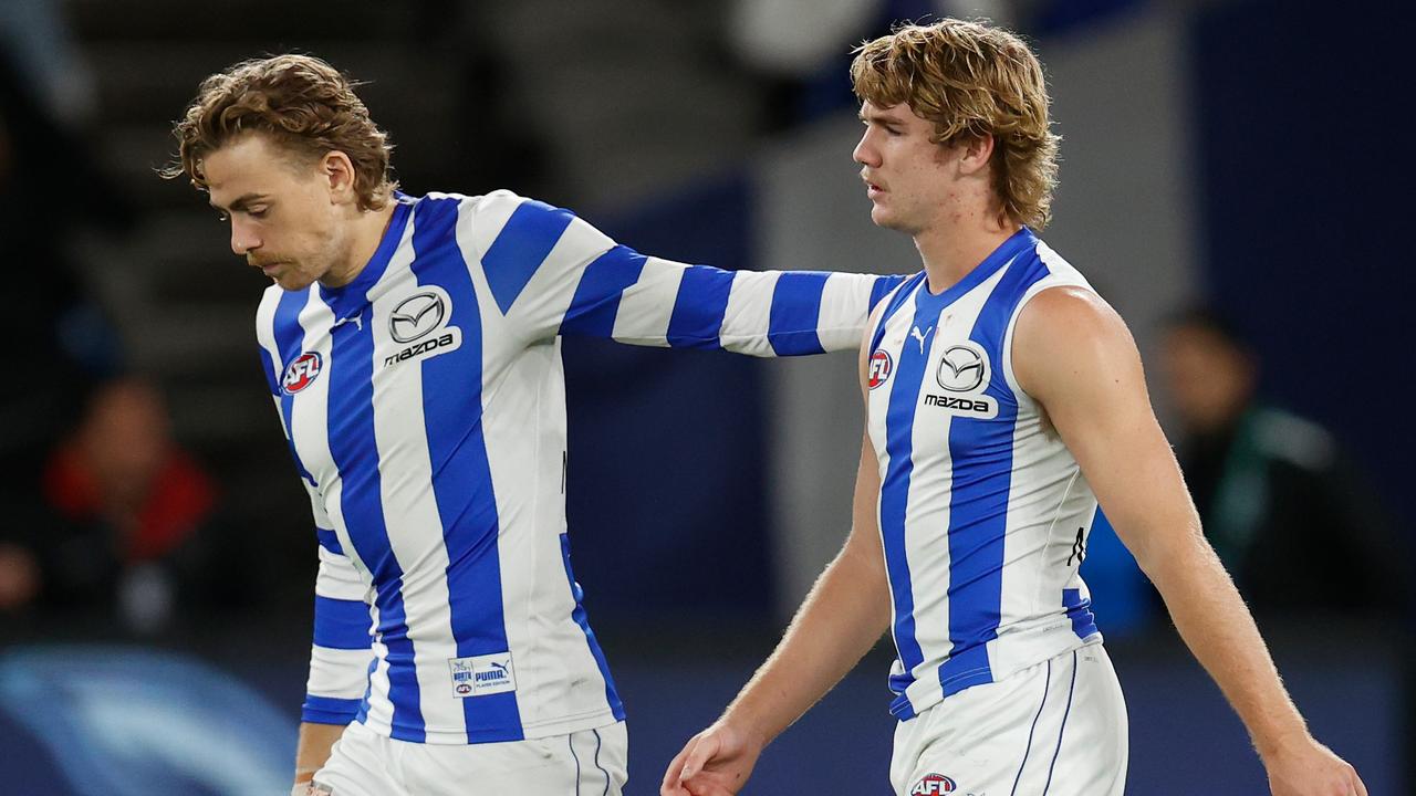 MELBOURNE, AUSTRALIA - JUNE 12: Hugh Greenwood (left) and Jason Horne-Francis of the Kangaroos look on during the 2022 AFL Round 13 match between the North Melbourne Kangaroos and the GWS Giants at Marvel Stadium on June 12, 2022 in Melbourne, Australia. (Photo by Michael Willson/AFL Photos via Getty Images)