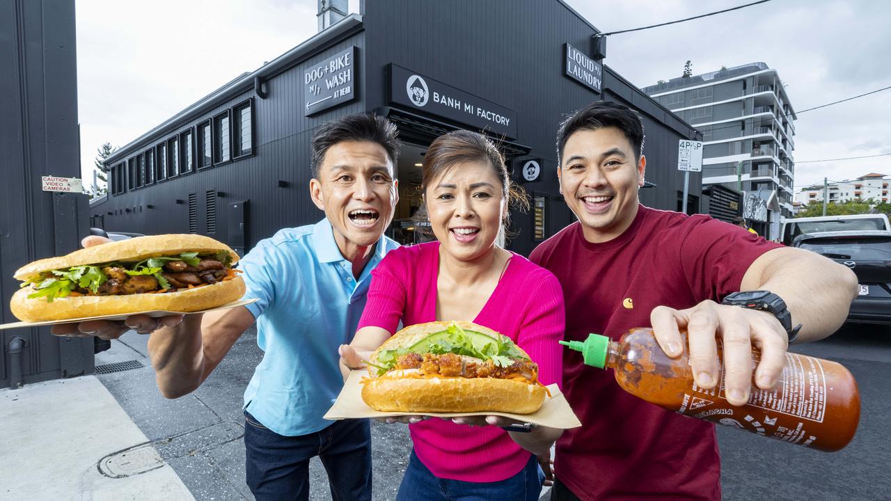 Francis Chung with wife Lisa Pham and brother-in-law Tony Pham at Banh Mi Factory, Newstead have been voted best banh mi in Queensland. Picture: Richard Walker