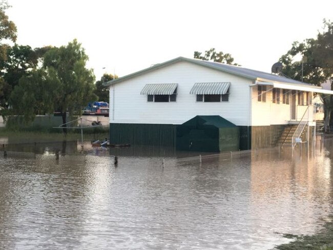 Homes have started to flood in Wood St, Depot Hill. Picture: Melanie Plane