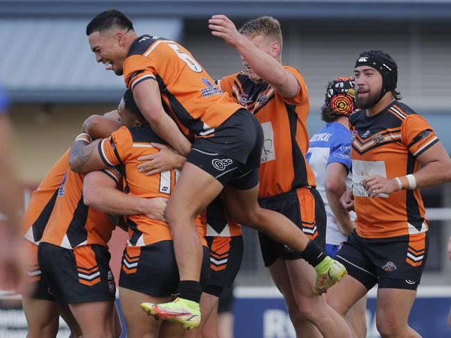 Southport Tigers players celebrate a try scored by Benjamin Thomas against Tugun Seahawks during the Grade A Gold Coast Rugby League grand final played at the UAA Park, Miami, Gold Coast, Sunday, September 10, 2023. Photo: Regi Varghese