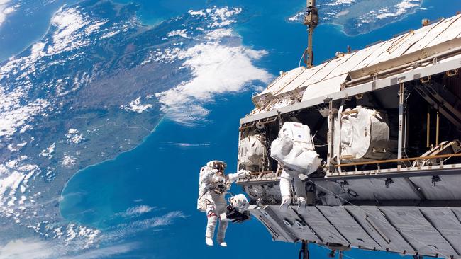 A view of Earth as astronauts perform a spacewalk at the International Space Station.