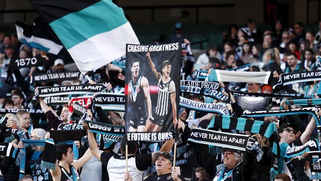 Port Adelaide fans cheer before the clash between the Power and Collingwood at the MCG on Sunday, Those fans are likely to miss the round 12 game against Fremantle at Adelaide Oval amid a Covid-19 scare. Picture: Dylan Burns/AFL Photos via Getty Images