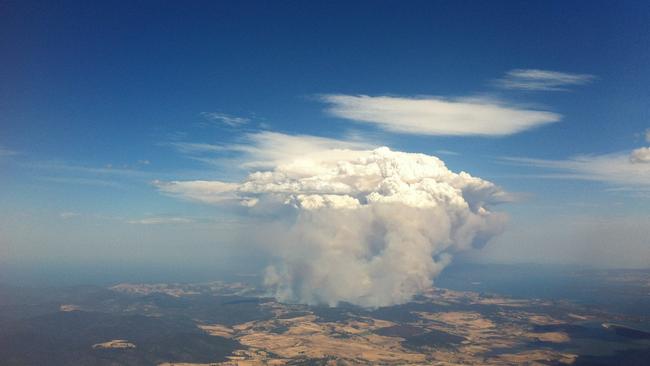 A pyrocumulonimbus thundercloud hangs over the Dunalley region after the devastating bushfires of 2013. Picture: Charles Gregory