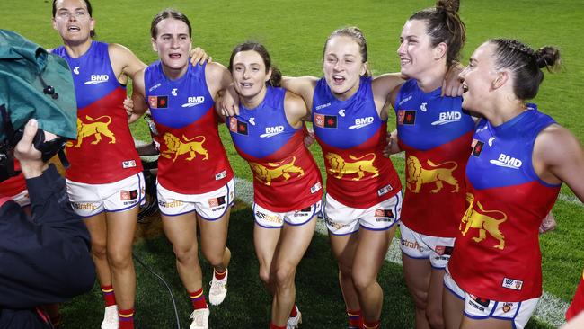 Brisbane players sing the team song after their latest victory. Picture: Darrian Traynor/Getty Images