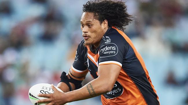 SYDNEY, AUSTRALIA - APRIL 17: Luciano Leilua of the Tigers runs the ball during the round six NRL match between the South Sydney Rabbitohs and the Wests Tigers at Stadium Australia, on April 17, 2021, in Sydney, Australia. (Photo by Brett Hemmings/Getty Images)