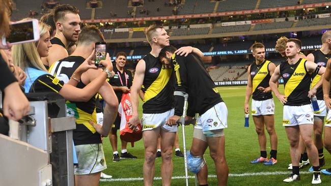 Richmond players lifted without some of their brightest stars this season. Picture: AAP