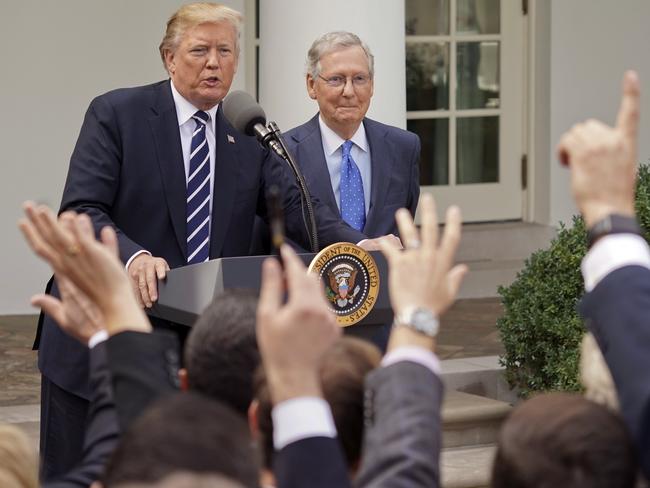 Donald Trump fields questions from reporters aside Senate majority leader Mitch McConnell on Monday afternoon. Picture: AP Photo/Pablo Martinez Monsivais