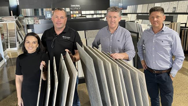 National Tiles and Carpet Call co-owners Tamara and Dean Parfrey with Knight Frank sales and leasing executives Dan Place and Mark Fitzgerald. Picture: Leighton Smith.