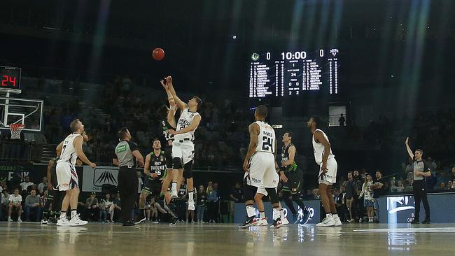 Tip-off during the NBL game between the South East Melbourne Phoenix and the Adelaide 36ers at Melbourne Arena last week. Picture: Daniel Pockett/Getty