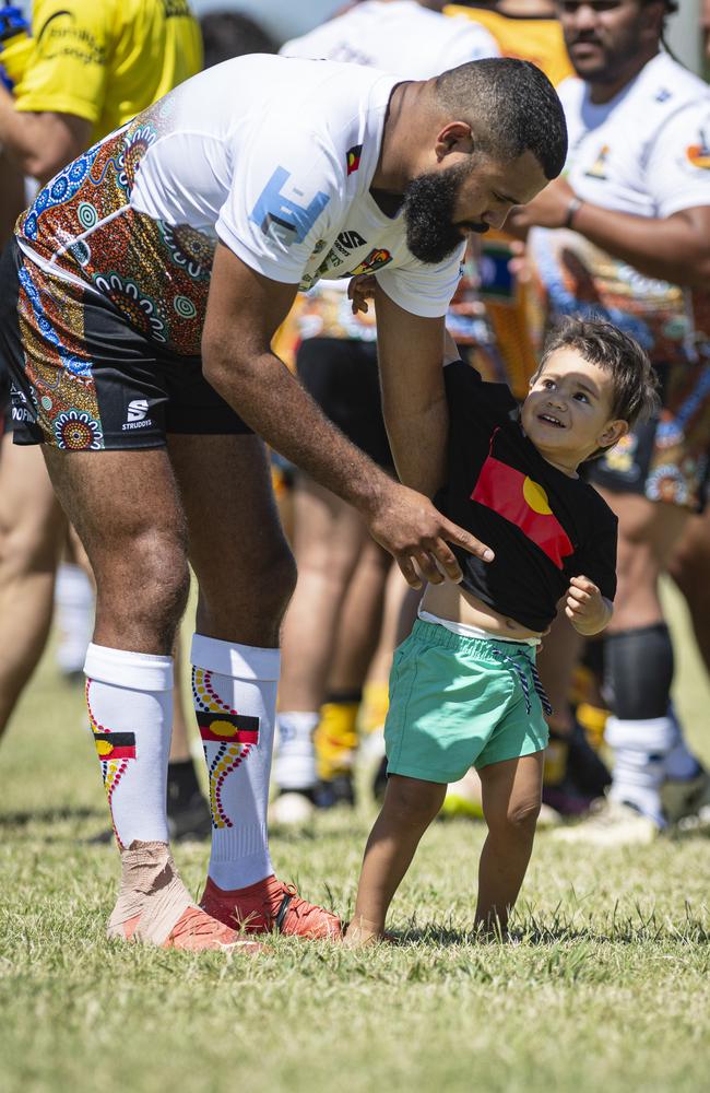 Jaydon Dos Adams Memorial player Tarun Schefe with his son Takai schefe after a game of the Warriors Reconciliation Carnival at Jack Martin Centre, Saturday, January 25, 2025. Picture: Kevin Farmer