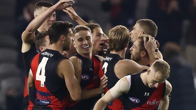 The Essendon players soak up their dominant win over a listless Adelaide outfit. Picture: Michael Klein