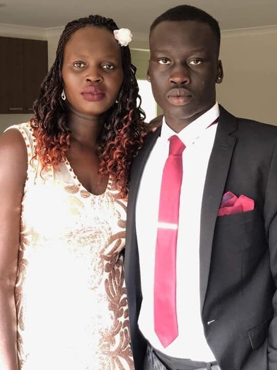 Aguer Akech Lual (right) with his mum, Martha Aluel Mayola.