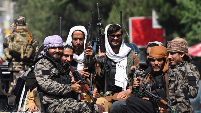 Taliban fighters patrol on vehicles along a street in Kabul, after the US military’s withdrawal from Afghanistan in 2021. Picture: AFP