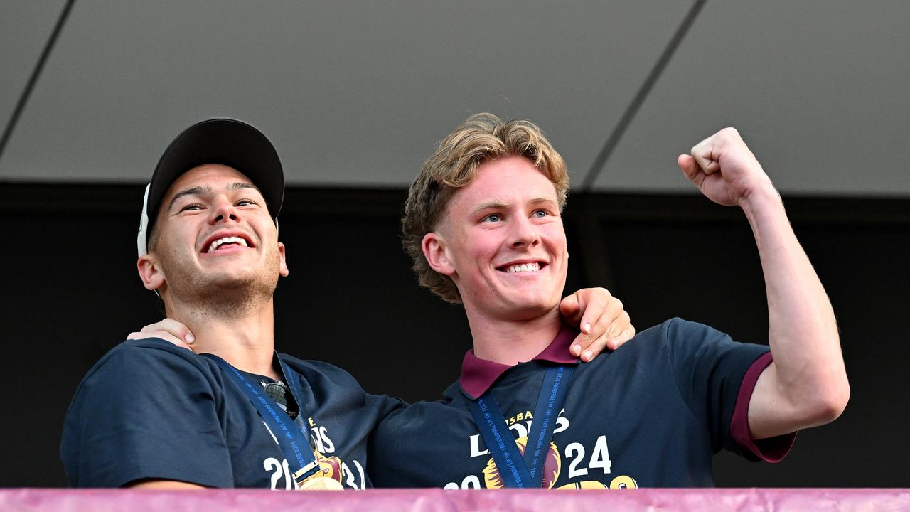 IPSWICH, AUSTRALIA - SEPTEMBER 29: Brisbane Lions AFL players celebrate with fans at Brighton Homes Arena, on September 29, 2024, in Ipswich, Australia. The Brisbane Lions won the 2024 AFL Grand Final yesterday beating Sydney Swans at the MCG. (Photo by Bradley Kanaris/Getty Images)