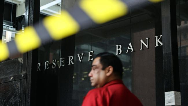 Signage at the Reserve Bank of Australia (RBA) building in Sydney, Australia, on Thursday, April 20, 2023. Australia's central bank should set up an expert policy board, hold fewer meetings and give press conferences explaining its decisions, according to recommendations from an independent review that would align it. Photographer: Brendon Thorne/Bloomberg