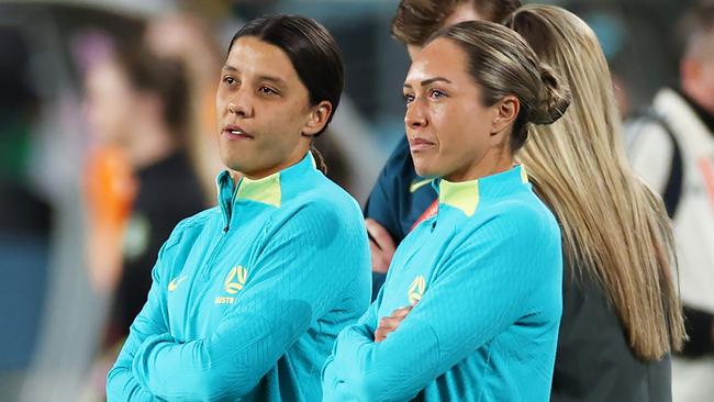 Sam Kerr and Katrina Gorry on the field before kick-off. Photo by Cameron Spencer/Getty Images.