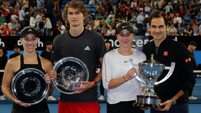 Germany’s Angelique Kerber and Alexander Zverev pose with Hopman Cup winners, Switzerland’s Belinda Bencic and Roger Federer at RAC Arena in Perth. Pictures: Will Russell/Getty Images