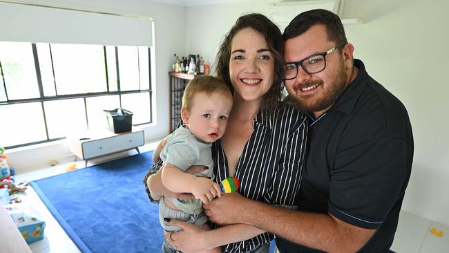 Nicola Reid, Ryan Przeklasa and their baby Parker Przeklasa. When they moved to Redbank Plains, they knew it would be the perfect place to raise their child at a price they could afford. Picture: Lyndon Mechielsen/Courier Mail