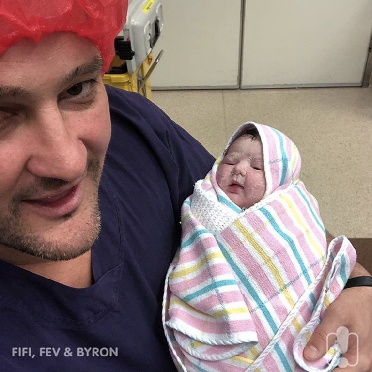 Fev with his baby girl, Tobi.