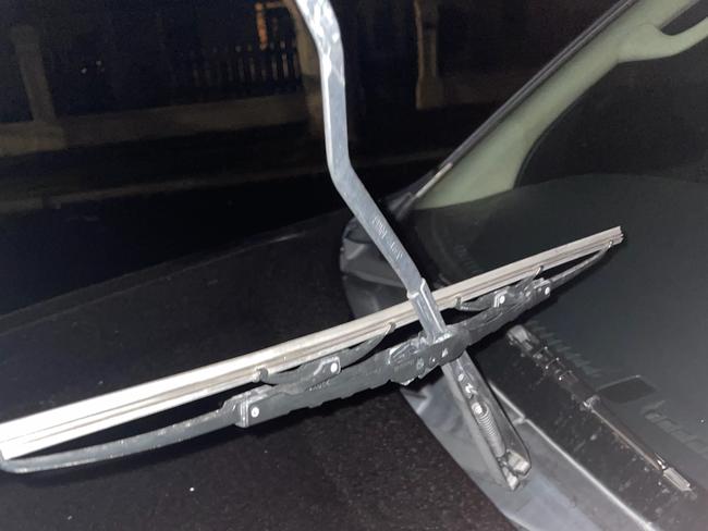 Damage to Master Builders Association cars, including a broken windscreen wiper. Pictures: supplied