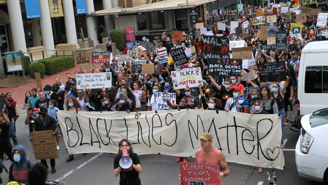 Thousands take to the streets of Cairns in support of the Black Lives Matter movement. Picture: PETER CARRUTHERS