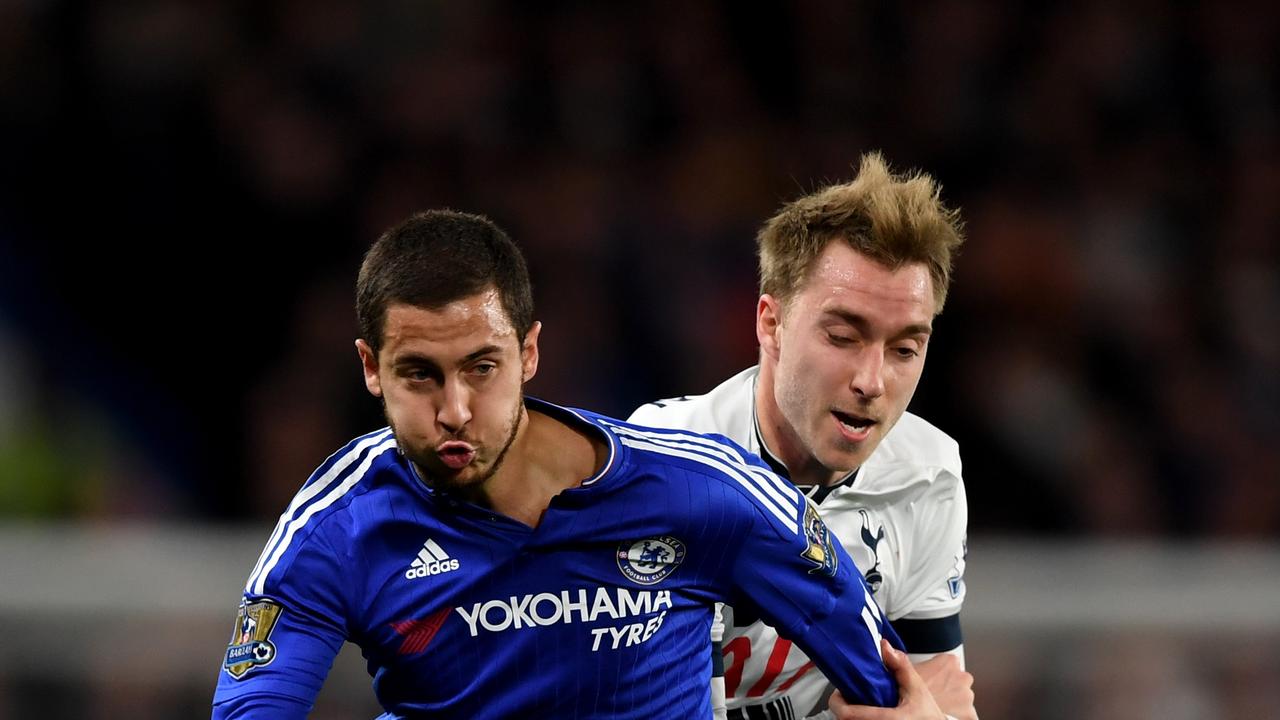 Eden Hazard of Chelsea holds off Christian Eriksen of Tottenham Hotspur